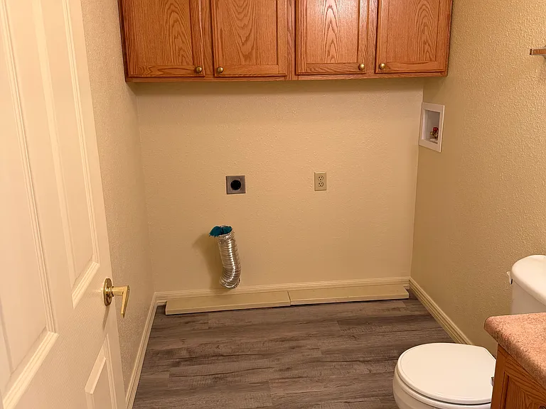 Laundry room, half bath.
