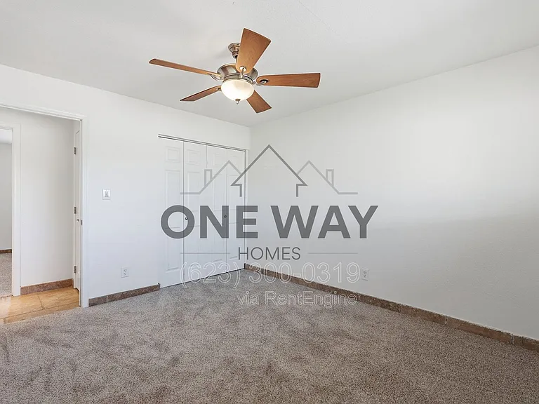 8702 E Sheridan St — Photo 16