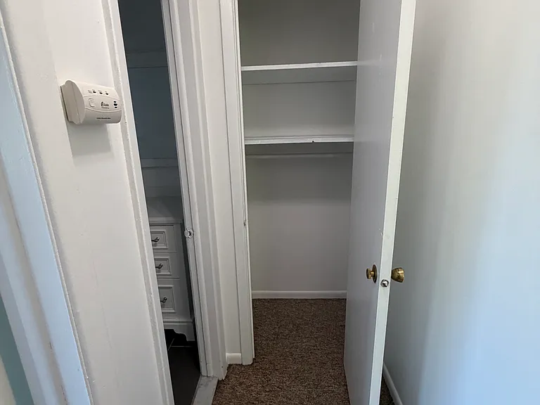 Closet outside bathroom