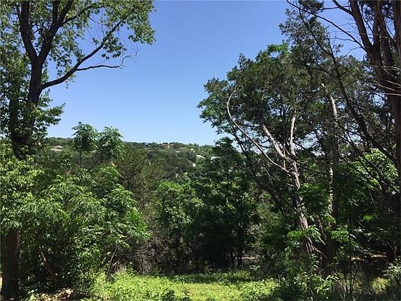 Tall trees flank the amazing panoramic views of Austin's Famous Hill Country.