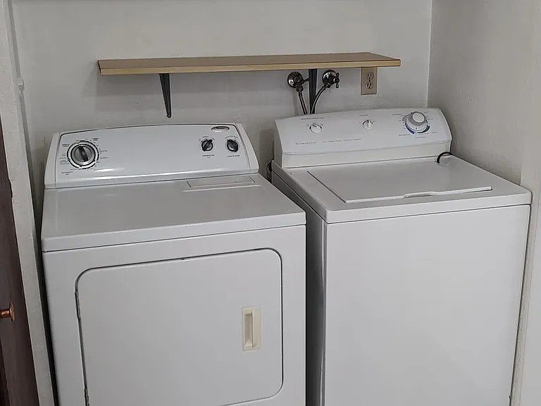 The washer and dryer are included, and located in a utility room off the kitchen.