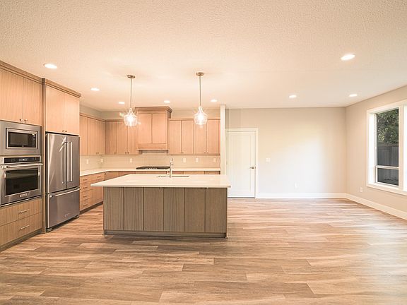 Kitchen with island and eating bar