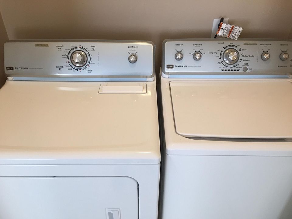 Full size washer/dryer in laundry room