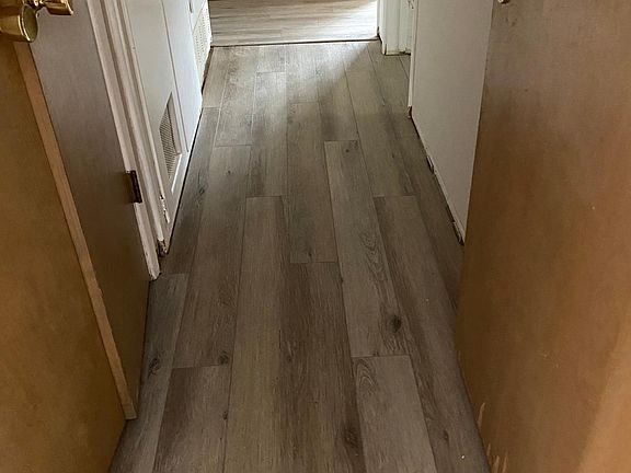 From the front door, hang right and this hallway will lead you to the bedrooms.