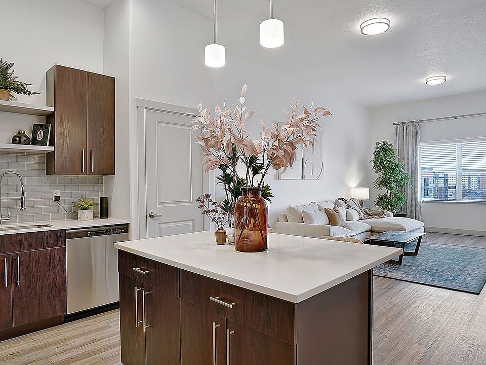 Modern kitchen island with open sightlines to the living space.