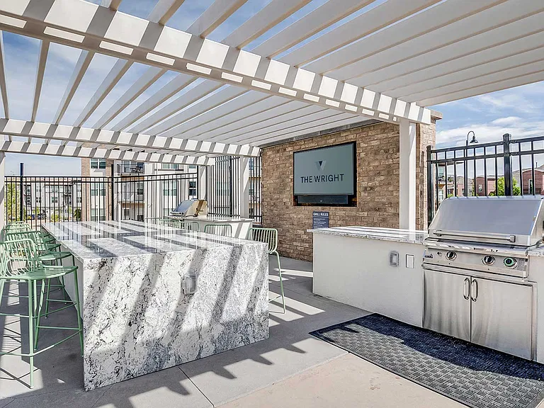 Gather with friends, grill outdoors, and enjoy thoughtfully designed social spaces featuring shaded seating, modern grilling stations, and upscale community amenities.