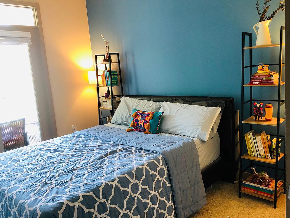 Bedroom (12' x 12') with balcony access