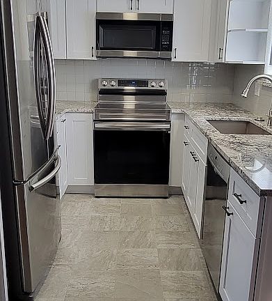 Kitchen remodel to be complete May 2025 to look like this identical unit.