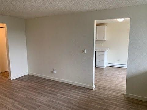 Spacious living room into dining room