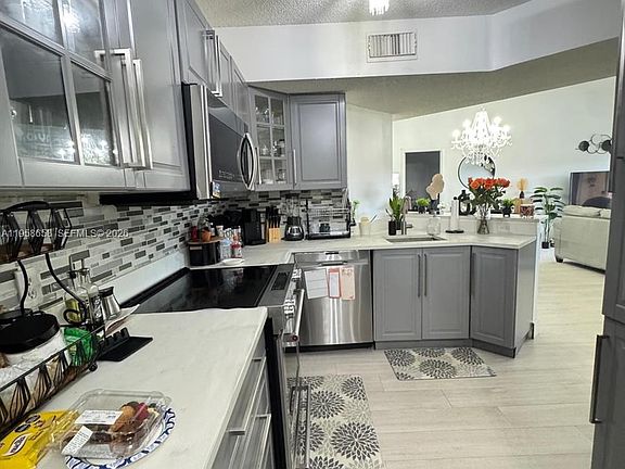 2nd image of 8801 Wiles Rd APT 308