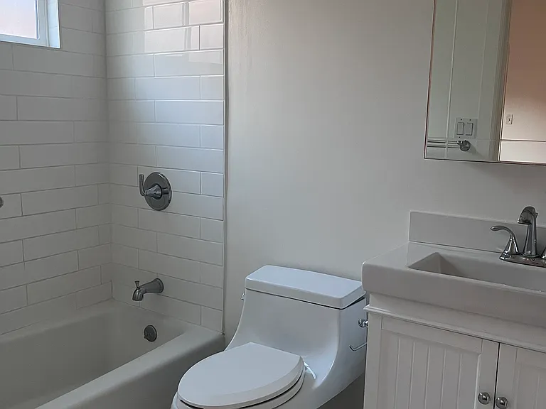 The primary bedroom's ensuite bathroom (one of two bathrooms in the unit)