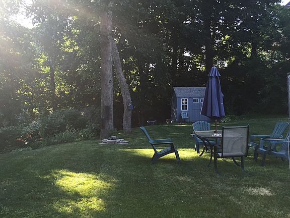 Semi-private back yard with fire pit