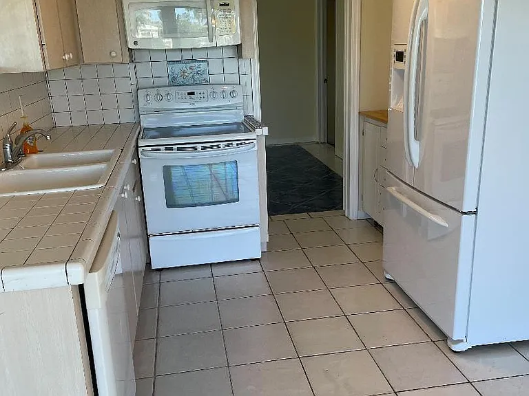 Kitchen - Dishwasher, Stove, Microwave, Refrigerator with Ice Maker