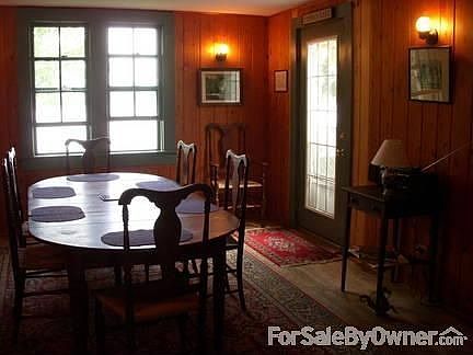 Dining Room
						:
						Beautiful view of the lake, large fireplace, sunny room