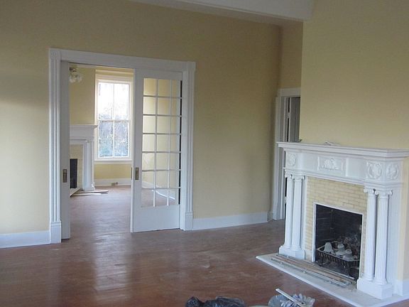 Living room mantle and pocket doors