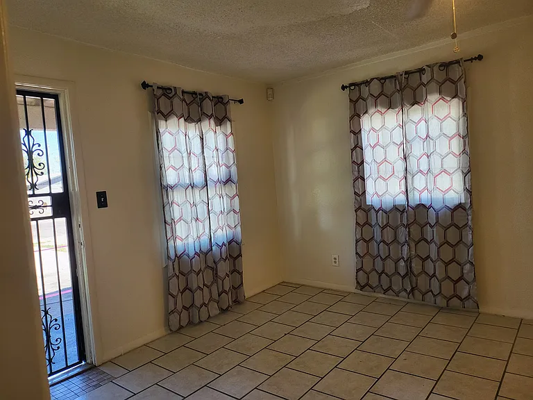 Living Room Area with New Curtains. Different colors in pictures to provide a different look.
