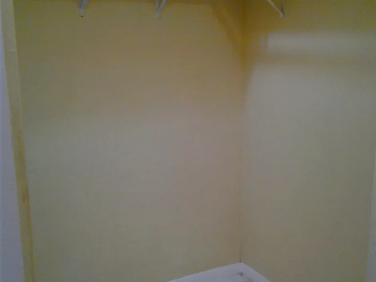 Walk in closet ready with extra poles for a customized desig