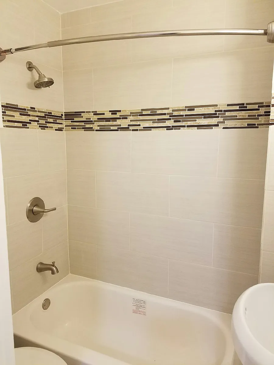 Building Photo - 52-42 83rd St #2