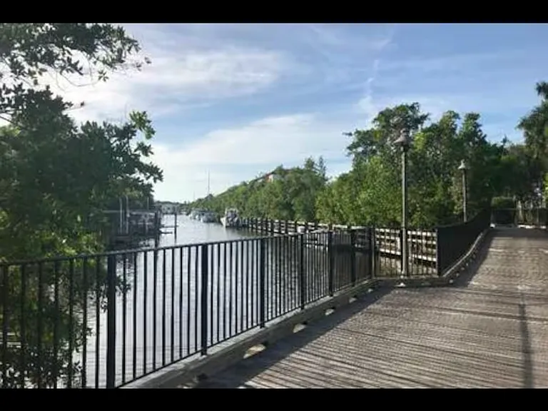 Enjoy a stroll along the water in this area of the park, which is on the corner. It leads to Naples Bay resort with Nosh restaurant and bar.