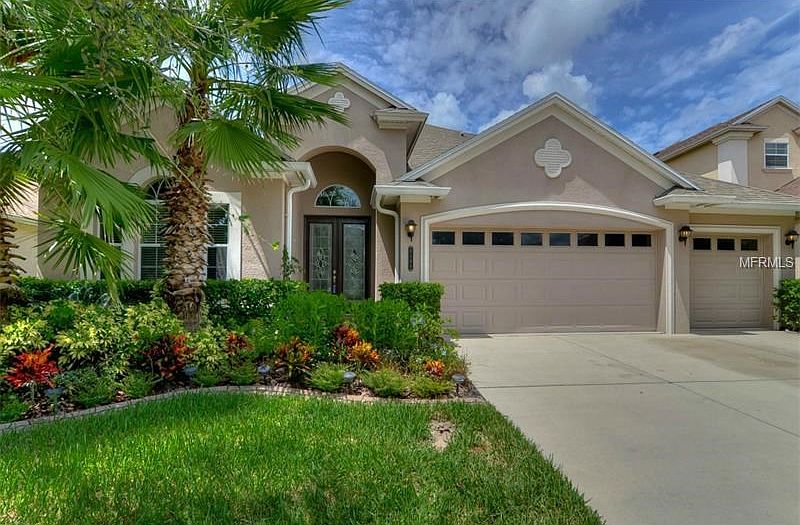 Lushly landscaped front yard