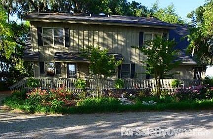 Main House
						:
						In typical lowcountry fashion, you enter in back, and the front faces the river.