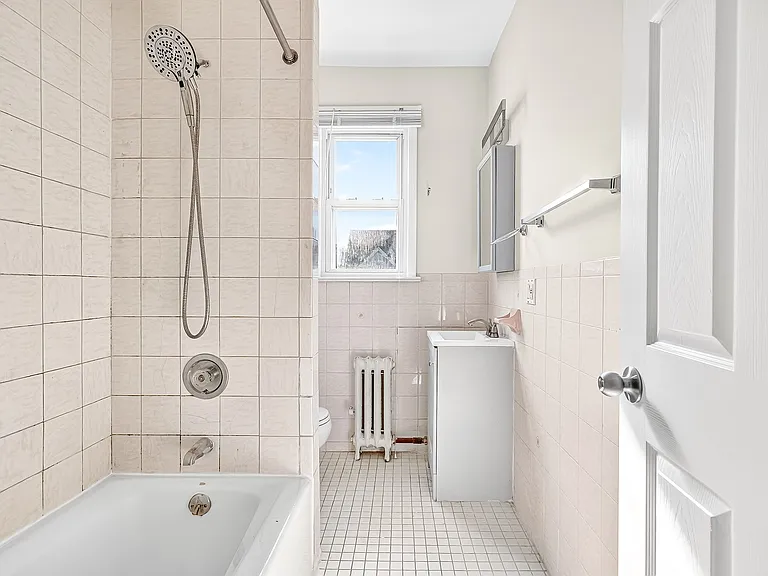 Bathroom with shower/tub combination.
