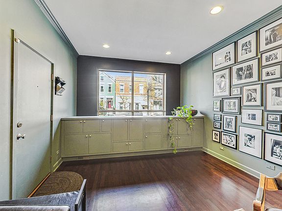 Entryway with built-in storage overlooking floor-to-ceiling window