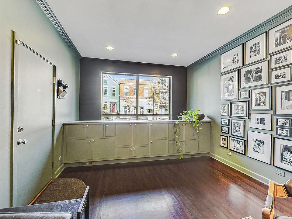 Entryway with built-in storage overlooking floor-to-ceiling window