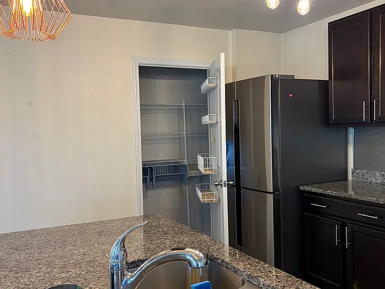 View of kitchen from the end of kitchen island