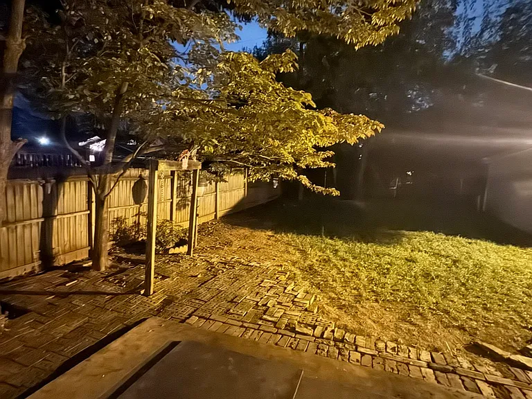 Backyard at night - city skyline view to the right.