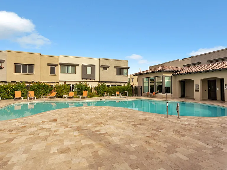 Plenty of chairs to enjoy the heated pool.