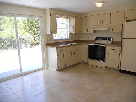 New tile in kitchen & bath