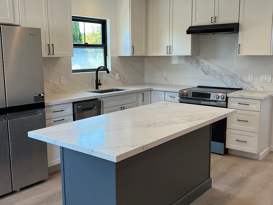Brand new appliances and quartz countertops. New Anderson windows throughout.