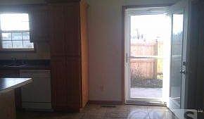 Kitchen opens to private patio