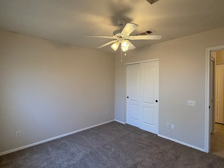 Bedroom 2 with new carpet & paint.
