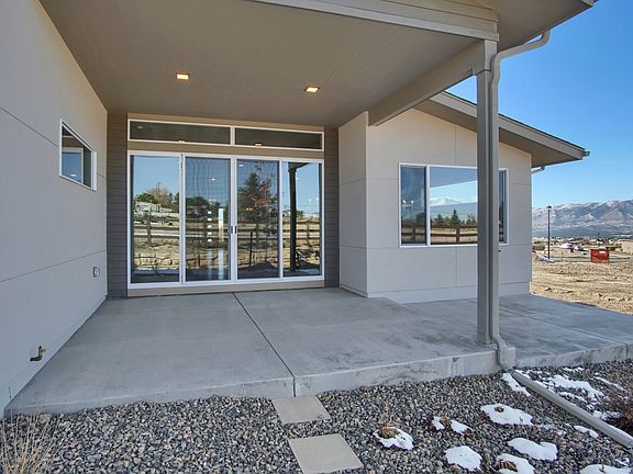 Covered Patio Photo representing home to be built and may demonstrate optional features