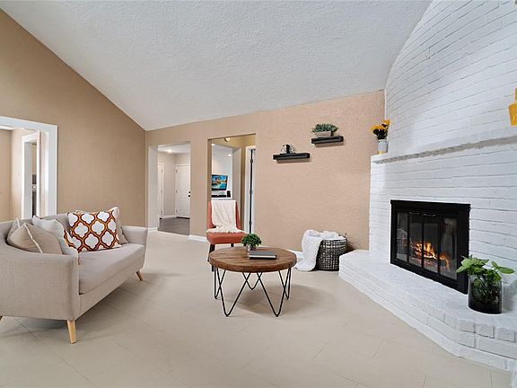A step inside reveals a refreshing open-concept set-up. The living space serves as the center of the home, with all other living spaces branching off, ideal for entertaining, relaxing, enjoyment.