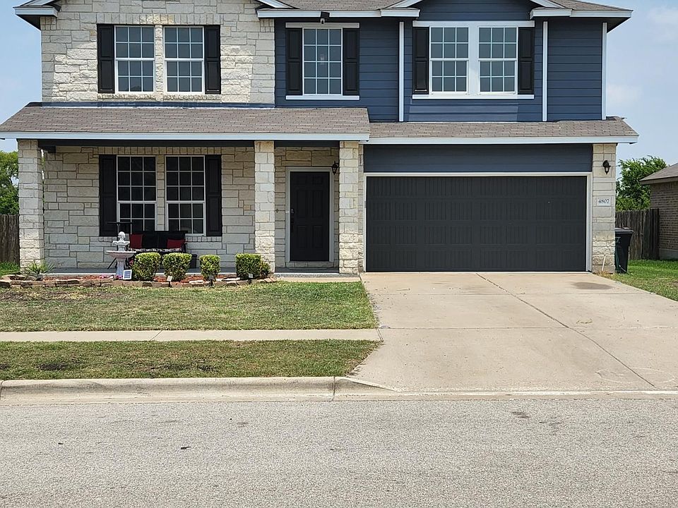 Front View to Home with tined windows