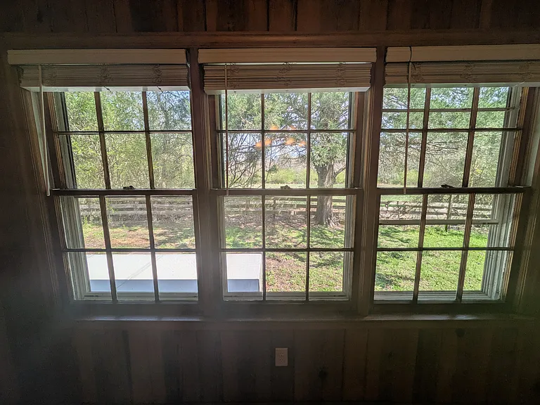 living room window view to fields/rear of home
