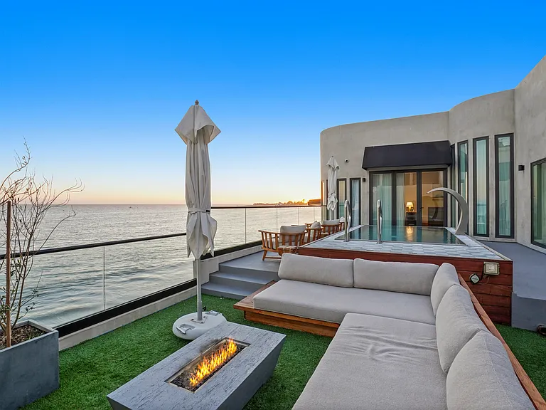 End each day by the fire, with the soothing sounds of the ocean nearby.