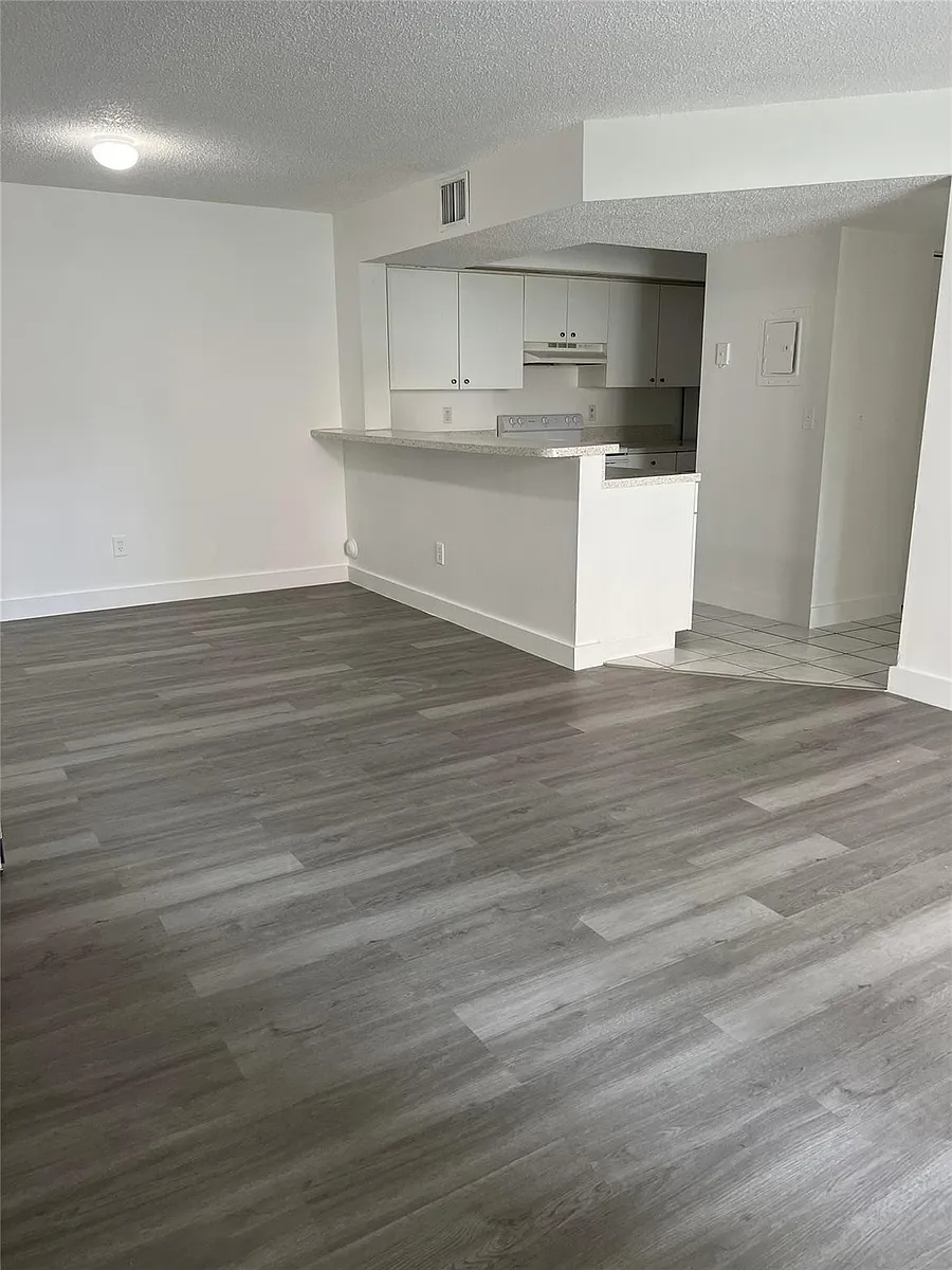Building Photo - 18860 NW 57th Ave #106