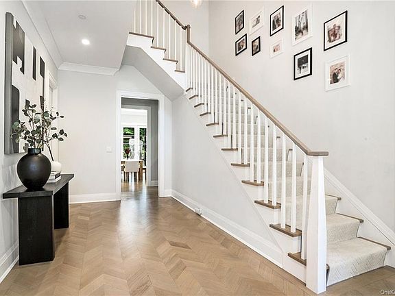 Entry - Entry Foyer with herringbone floors