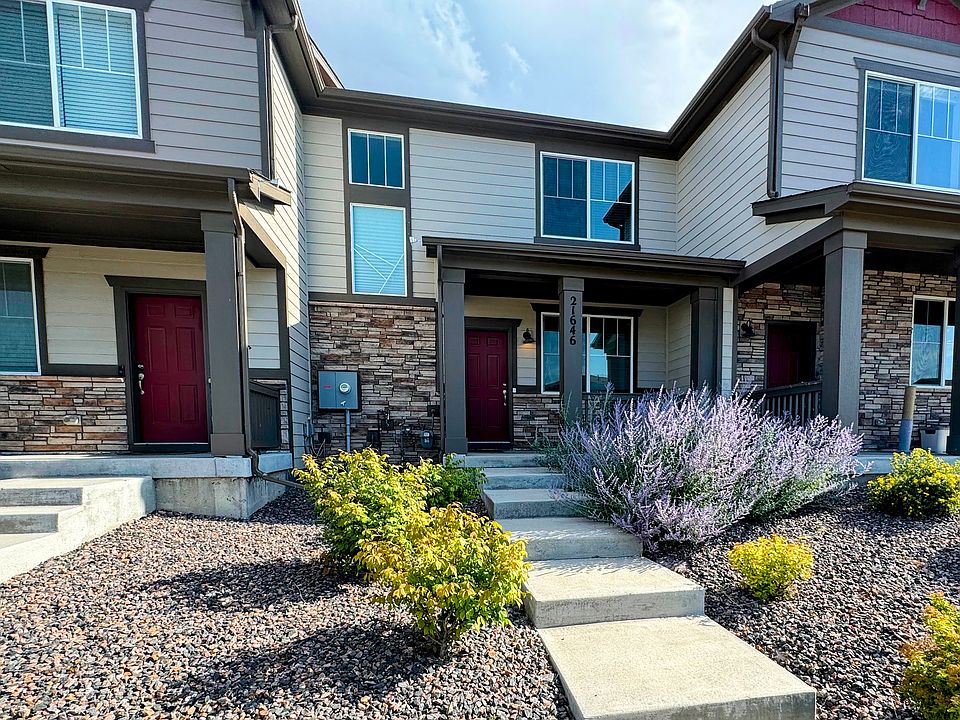 Charming modern townhome with covered patio and beautiful landscaping