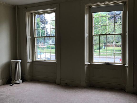 Living room facing west. Windows overlook historic Pulteney Park.