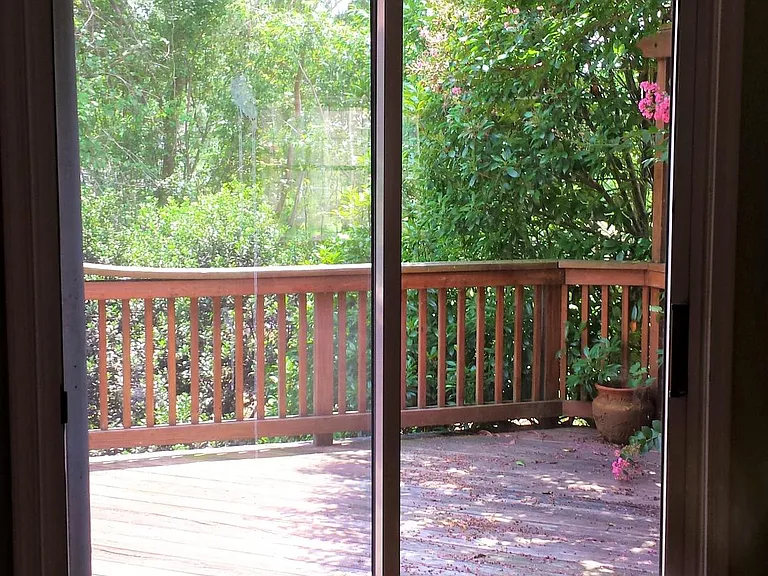 dining room and kitchen area to back deck