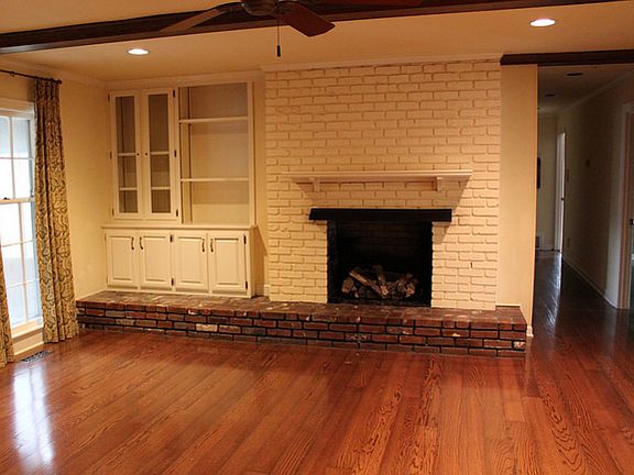 Large family room with built-ins and gas fireplace
