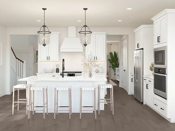 Kitchen with island and pendant lighting