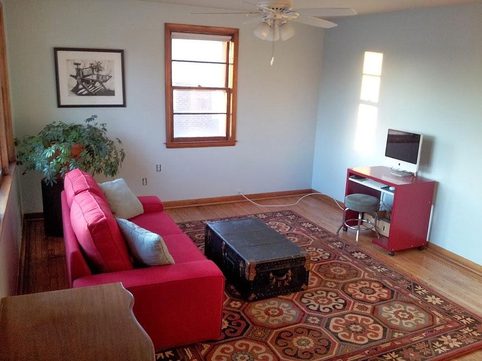 Living room has bay window, gets great light and breezes