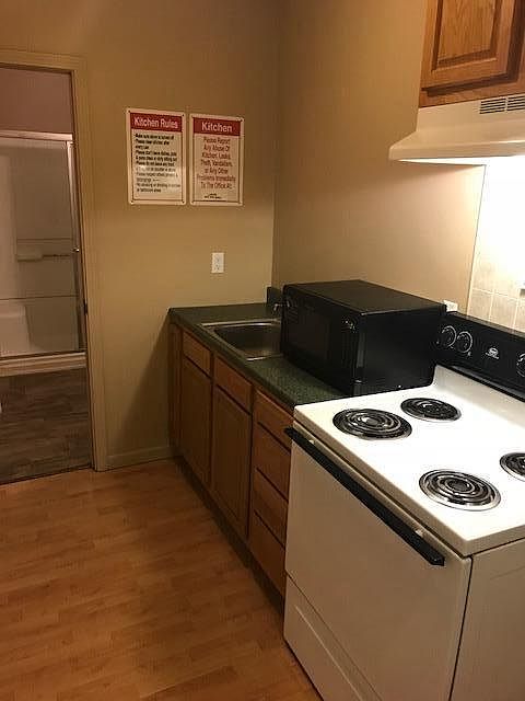 Shared kitchen with oven and microwave