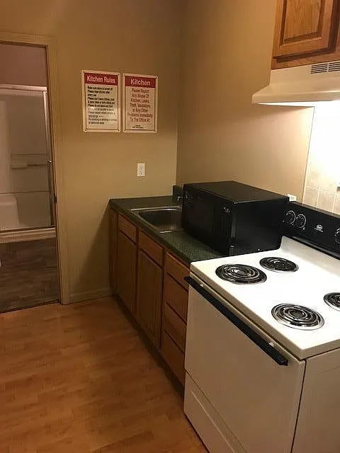 Shared kitchen with oven and microwave